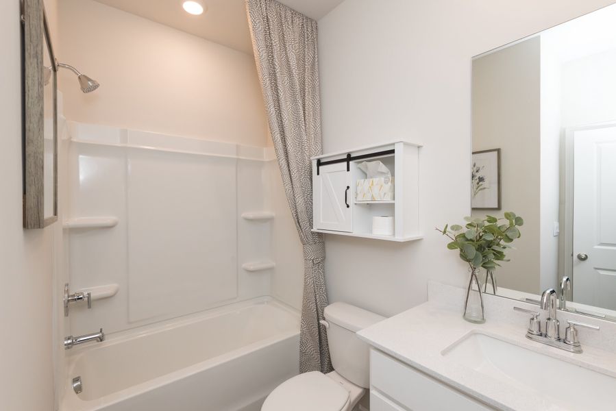 Furnished interior view inside a new home in Vines at Mill Creek - Estate Series, Braselton (Image 8).