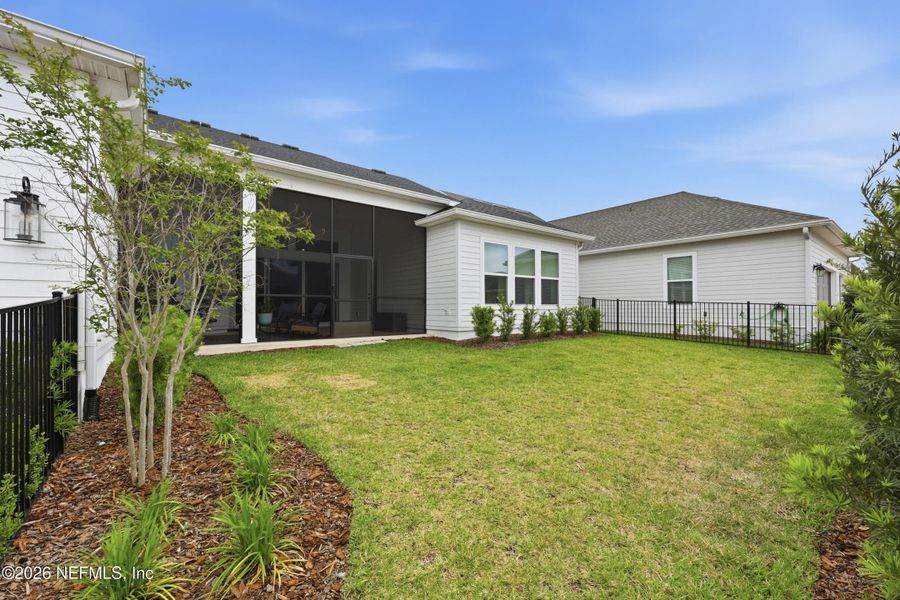 Exterior details and patio area of a home in Seven Pines 70' Rear Entry, Jacksonville (Image 3).