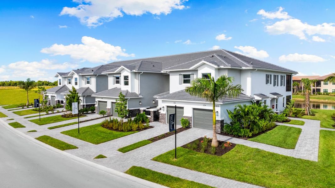 Representative exterior photo of a completed home built from the Marano by Taylor Morrison in Esplanade by the Islands Coach Homes, Naples, FL (Image 1). Representative exterior photo of a completed home built from the Marano by Taylor Morrison in Esplanade by the Islands Coach Homes, Naples, FL (Image 1).