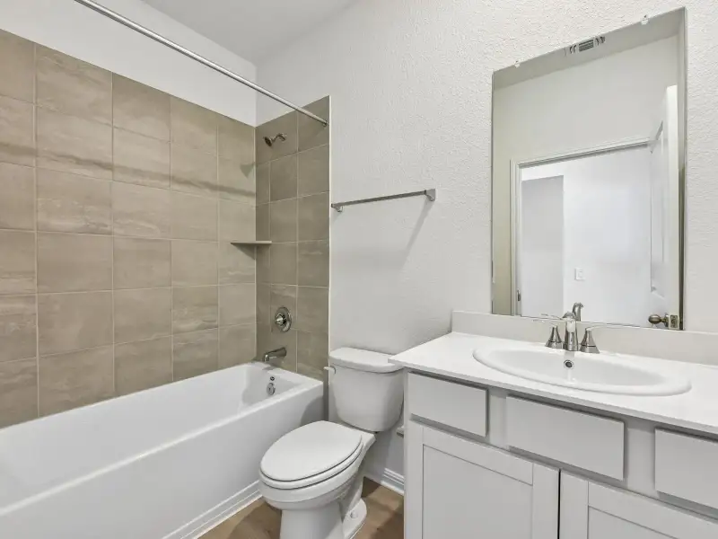 Furnished interior view inside a new home in Lexington Parke, Del Valle (Image 5).