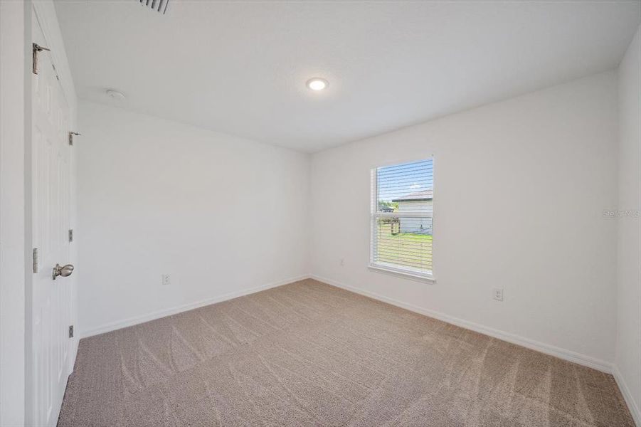 Spacious, unfurnished interior of a new home in , Port Charlotte (Image 21).