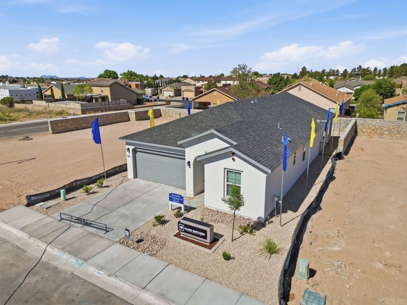 Representative exterior photo of a completed home built from the Santa Rosa by Hakes Brothers in Paseo Del Este, El Paso, TX (Image 23).