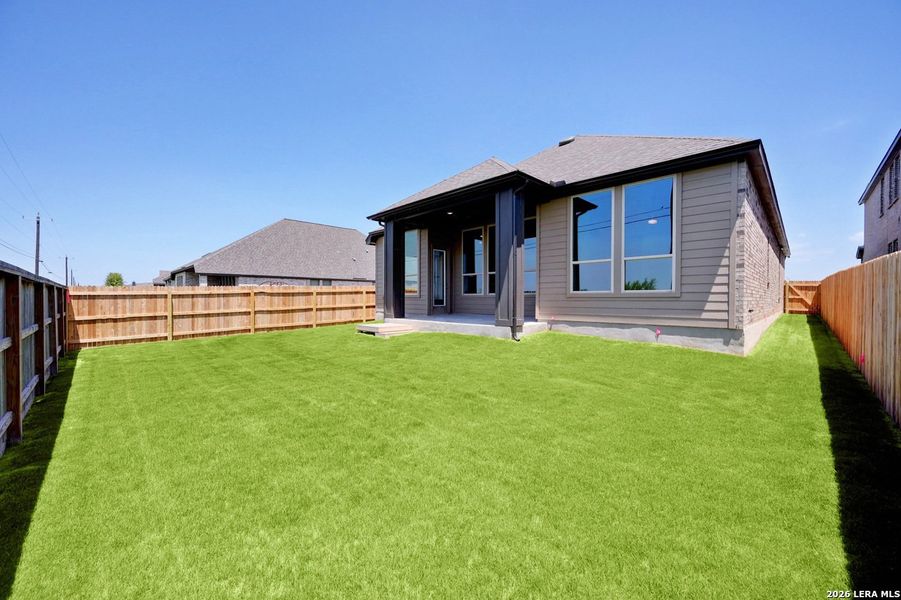 Exterior details and patio area of a home in Alsatian Oaks, Castroville (Image 3).