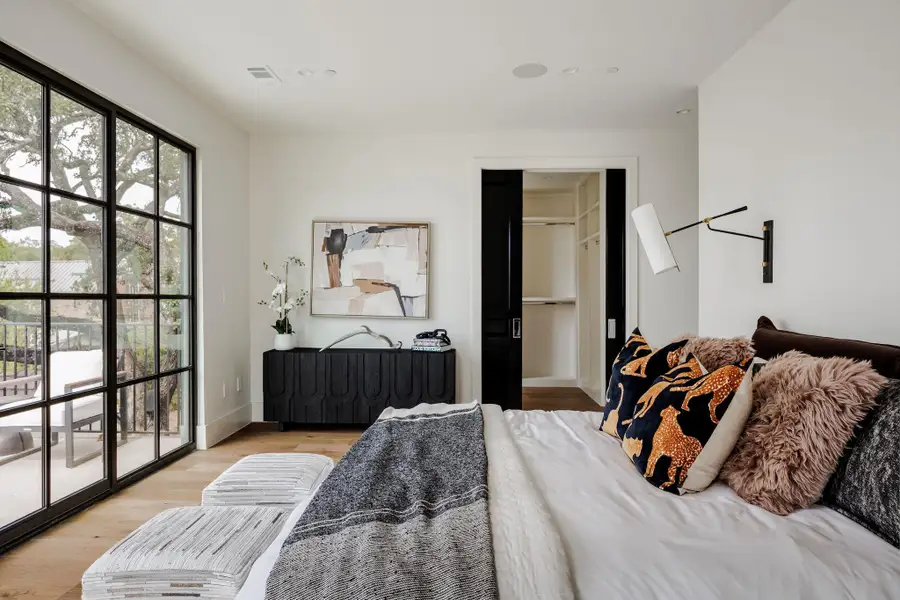 Elegant in proportion, the space balances warmth and luxury with access to a private balcony overlooking the lush backyard. Elegant in proportion, the space balances warmth and luxury with access to a private balcony overlooking the lush backyard.