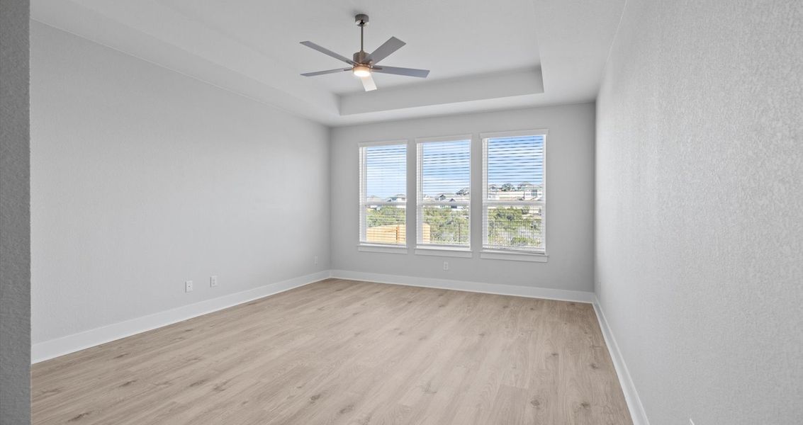 Representative unfurnished interior of a home built from the Raegan by Chesmar Homes in Sweetwater, Austin (Image 11).
