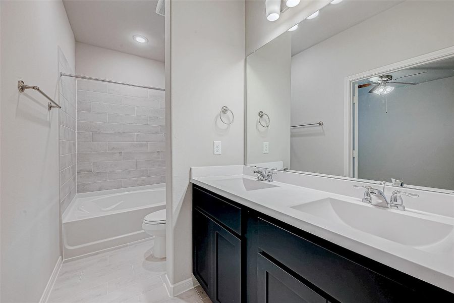 Furnished interior view inside a new home in Woodland Lakes, Huffman (Image 11).