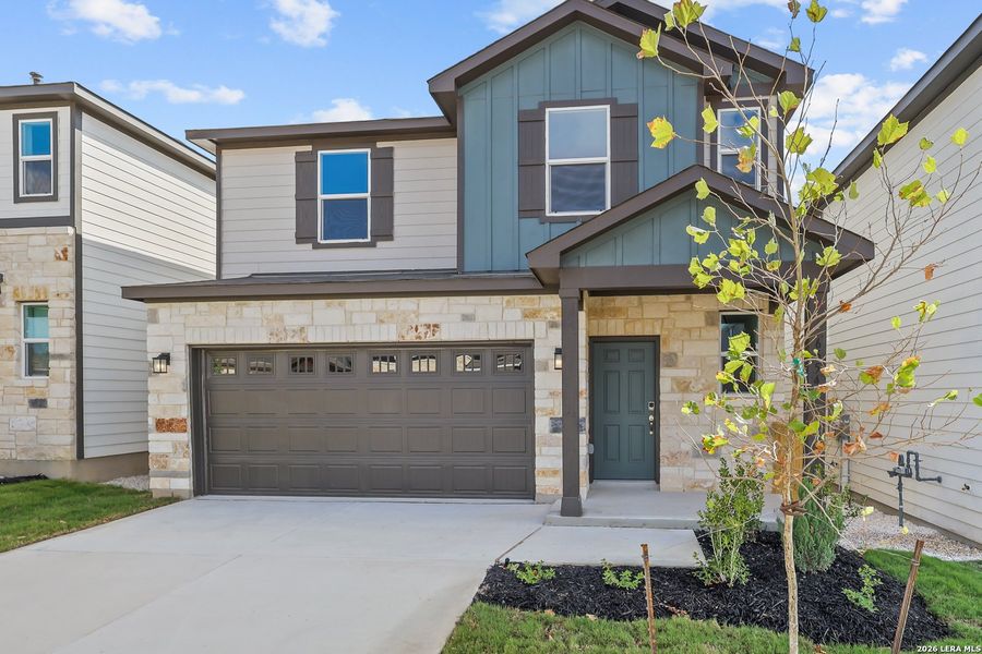 Front exterior of a new home in Senna, Leon Valley, TX, highlighting curb appeal (Image 1). Front exterior of a new home in Senna, Leon Valley, TX, highlighting curb appeal (Image 1).