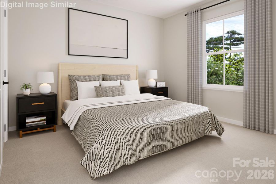 A welcoming guest bedroom filled with natural light — a clean, versatile space you can decorate to your own taste and style.
