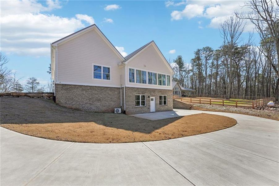Front exterior of a new home in , Canton, GA, highlighting curb appeal (Image 26).