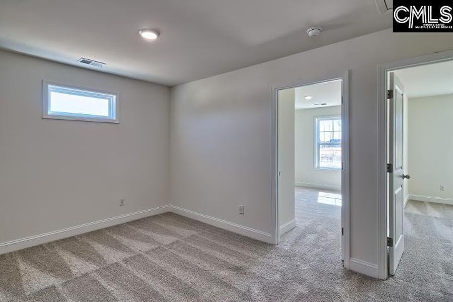 Spacious, unfurnished interior of a new home in Cottages at Roofs Pond, West Columbia (Image 36).