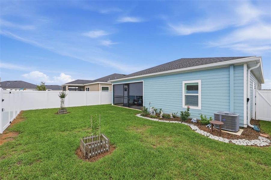 Exterior details and patio area of a home in Trailhead Landing, Alachua (Image 25).