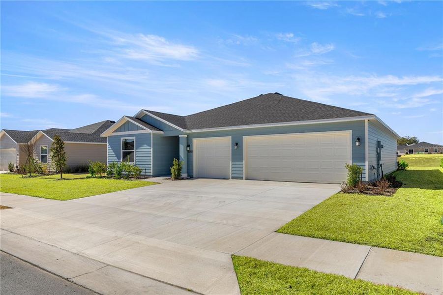 Front exterior of a new home in Marion Ranch, Ocala, FL, highlighting curb appeal (Image 5).