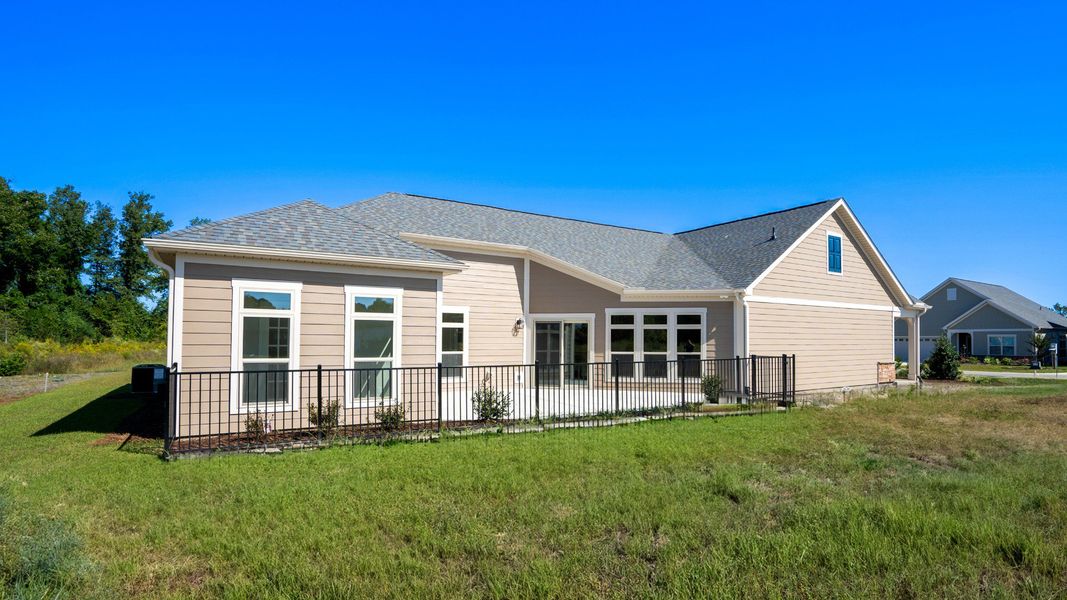 Representative exterior details of a home built from the Promenade III by Epcon Communities in Courtyards by Carrell, Ocean Isle Beach (Image 4). Representative exterior details of a home built from the Promenade III by Epcon Communities in Courtyards by Carrell, Ocean Isle Beach (Image 4).