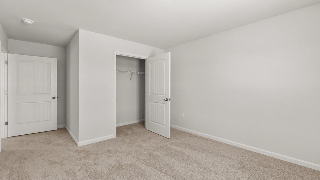Representative unfurnished interior of a home built from the Aisle by D.R. Horton in Aurora Creek, Dallas (Image 29).