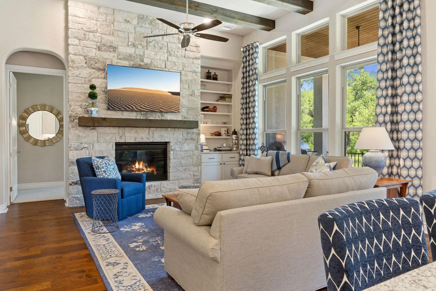 Large windows frame peaceful backyard views and bring the outdoors in. Large windows frame peaceful backyard views and bring the outdoors in.