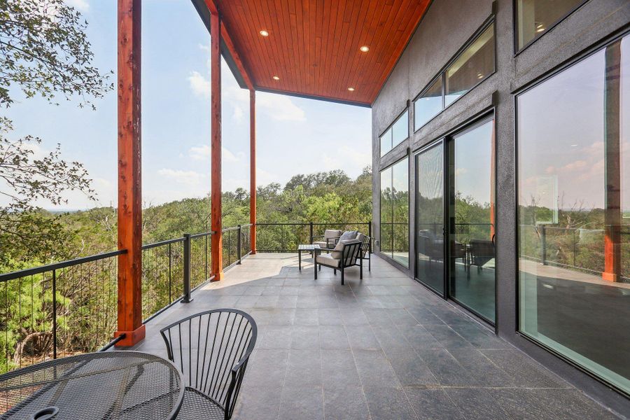 View of patio with a balcony View of patio with a balcony