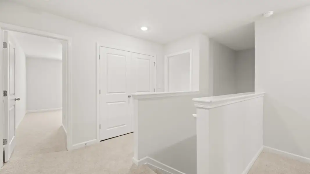 Representative unfurnished interior of a home built from the Pattison by D.R. Horton in Branford Crossing, Stockbridge (Image 10).