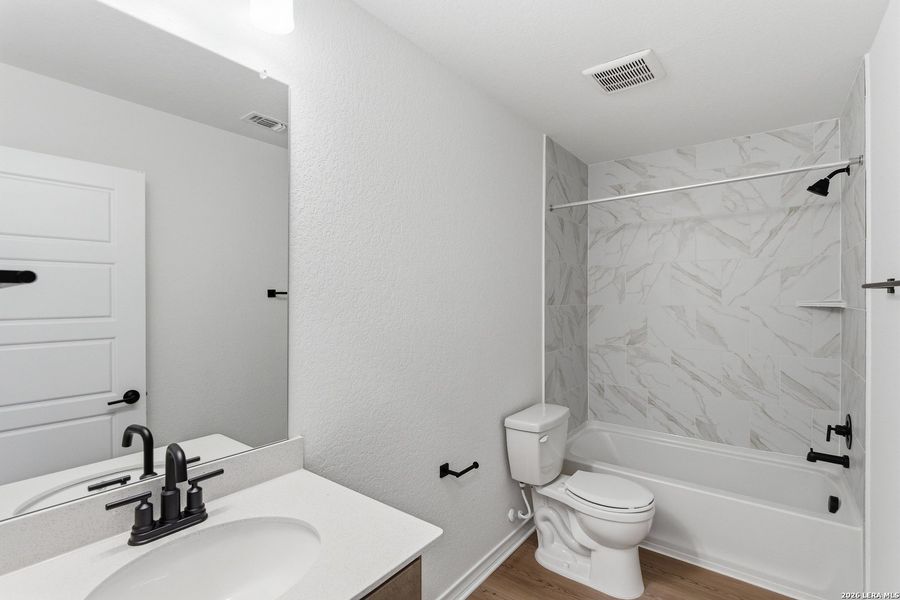 Furnished interior view inside a new home in Nopal Valley, San Antonio (Image 8).