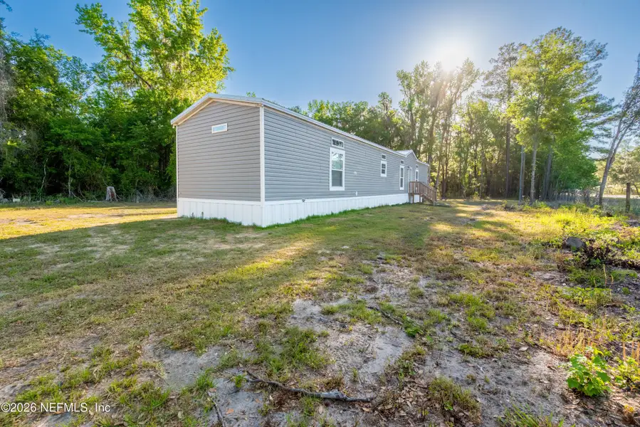 Exterior details and patio area of a home in , Gainesville (Image 17).