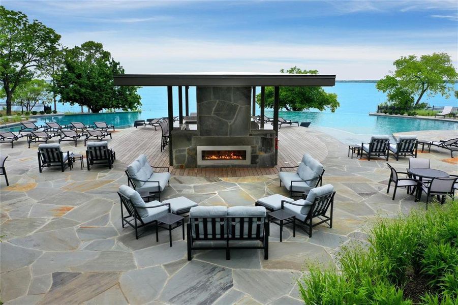 Lakeside community pool with infinity edge overlooking Lake Lewisville
