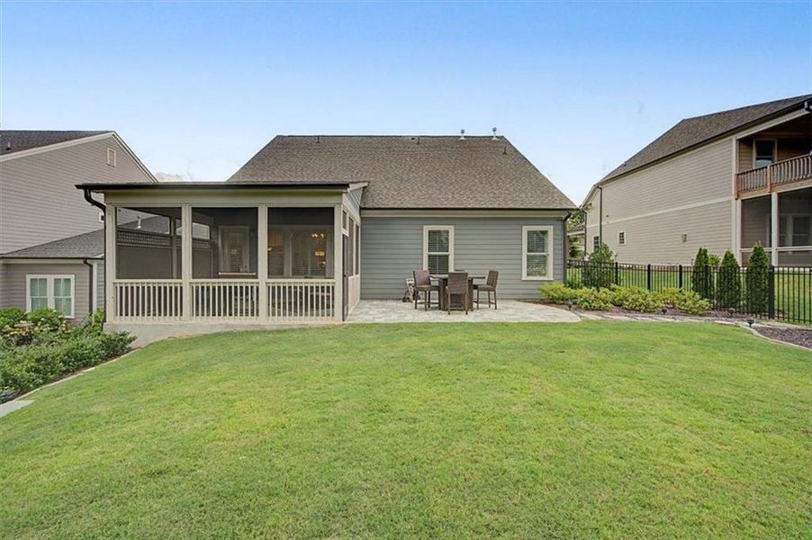 Exterior details and patio area of a home in Lakeside at River Green, Canton (Image 4).