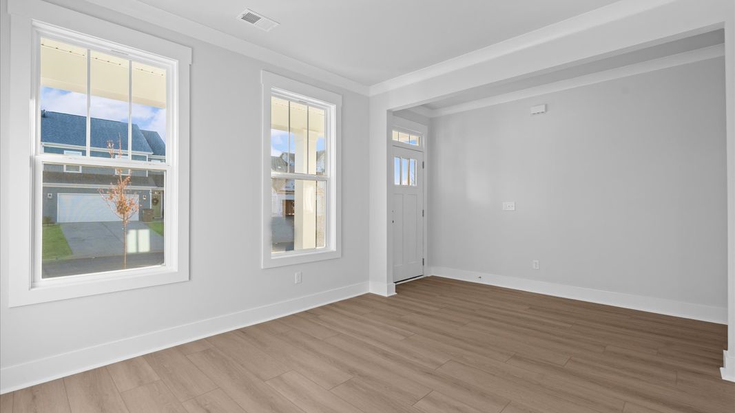 Memorable multi-use flex room with current styling and accomplished finishes