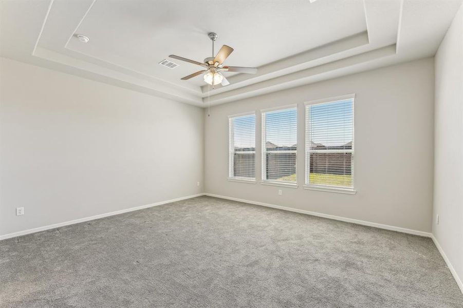 Escape to your private retreat in this spacious and serene bedroom.