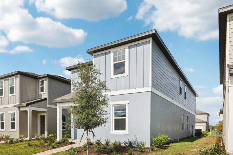 Representative exterior photo of a completed home built from the Lyon by Starlight Homes in Hawks Run, Kissimmee, FL (Image 2). Representative exterior photo of a completed home built from the Lyon by Starlight Homes in Hawks Run, Kissimmee, FL (Image 2).