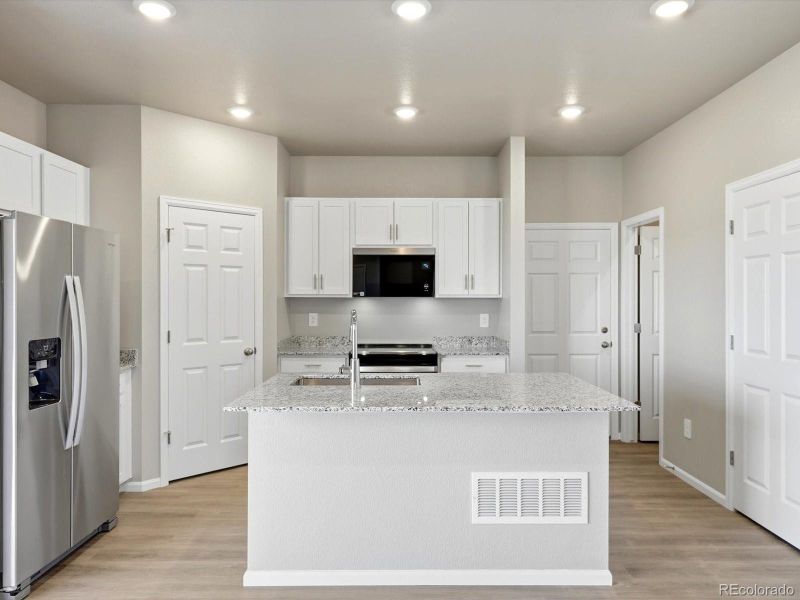 Furnished interior view inside a new home in , Thornton (Image 11).