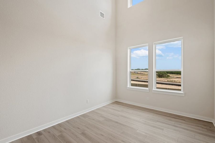 Spacious, unfurnished interior of a new home in Arbor Collection At Wolf Ranch, Georgetown (Image 21).