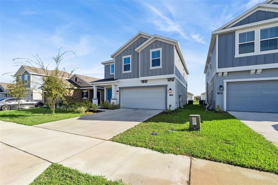 Exterior details and patio area of a home in Peace Creek Reserve: Legacy Collection, Winter Haven (Image 2). Exterior details and patio area of a home in Peace Creek Reserve: Legacy Collection, Winter Haven (Image 2).