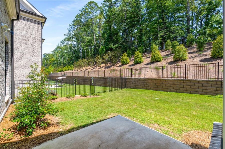Front exterior of a new home in , Johns Creek, GA, highlighting curb appeal (Image 26). Front exterior of a new home in , Johns Creek, GA, highlighting curb appeal (Image 26).