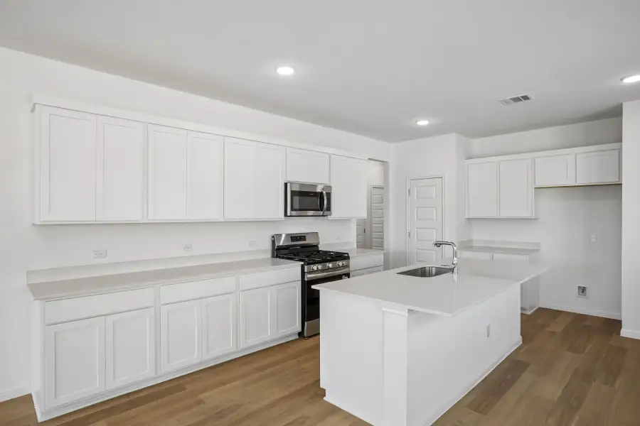 Furnished interior view inside a new home in Trinity Ranch, Elgin (Image 9).