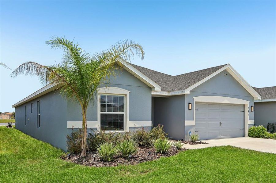 Front exterior of a new home in The Crossings - Single-Family Homes, St. Cloud, FL, highlighting curb appeal (Image 27).