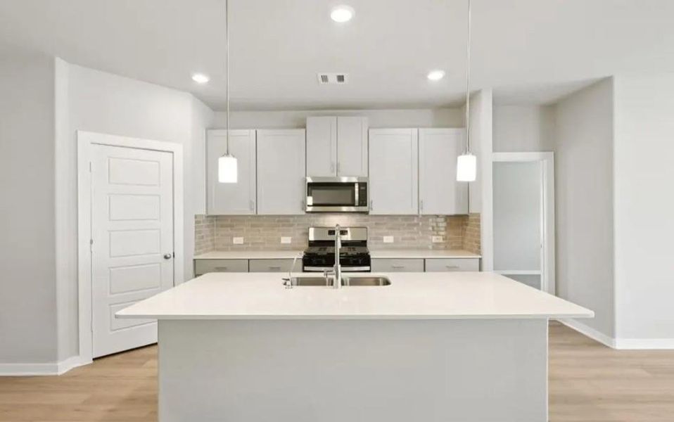 Photo is not of the actual home, but is an inspirational photo of builder’s model home and may depict options, furnishings, and/or decorator features that are not included.