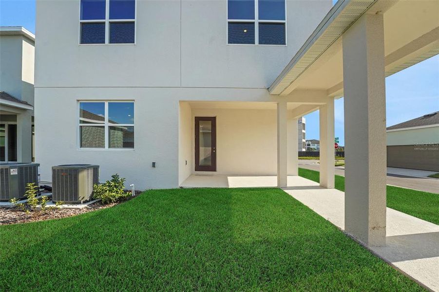 Exterior details and patio area of a home in Crossroads at Kelly Park, Apopka (Image 21). Exterior details and patio area of a home in Crossroads at Kelly Park, Apopka (Image 21).