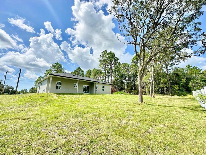 Front exterior of a new home in , Citrus Springs, FL, highlighting curb appeal (Image 20).