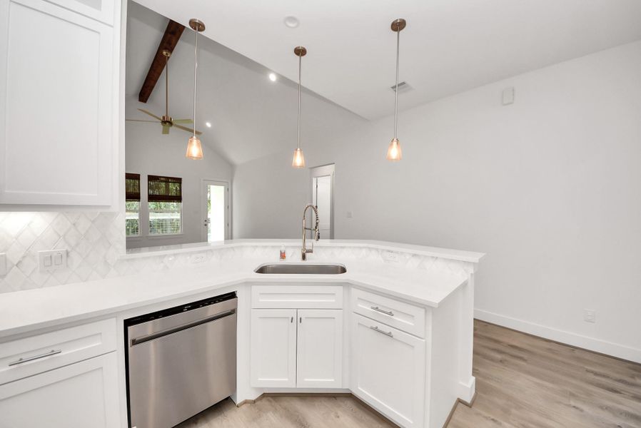 Kitchen and living area combination perfect for entertaining.