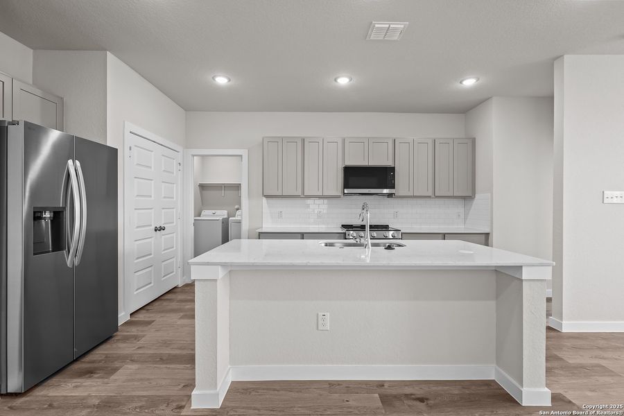 Furnished interior view inside a new home in Applewhite Meadows, San Antonio (Image 8). Furnished interior view inside a new home in Applewhite Meadows, San Antonio (Image 8).