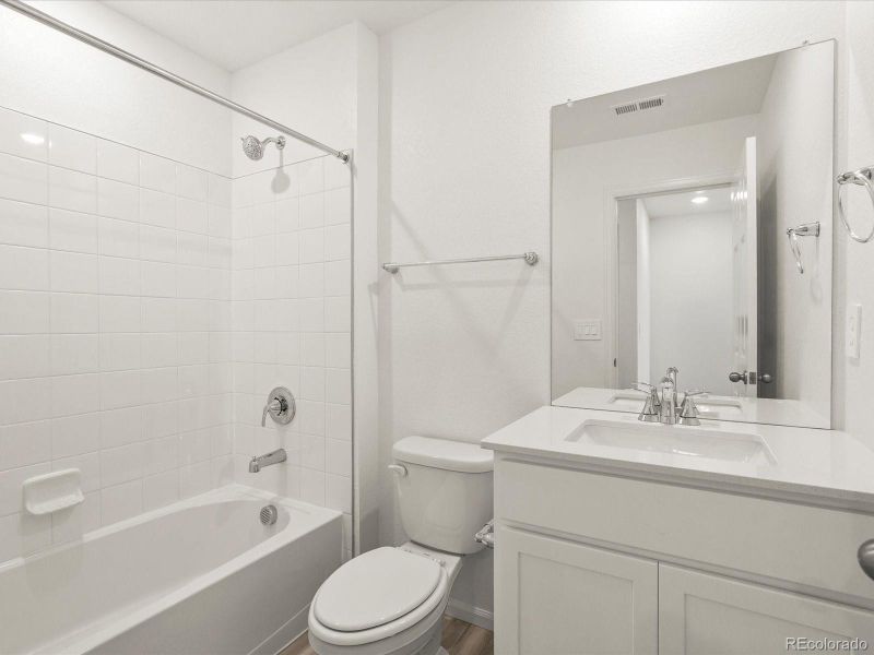 Furnished interior view inside a new home in Skyview at High Point, Aurora (Image 15).