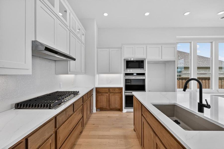 Furnished interior view inside a new home in Mosaic, Celina (Image 5).
