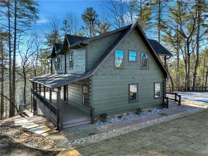 Exterior details and patio area of a home in , Ellijay (Image 27).