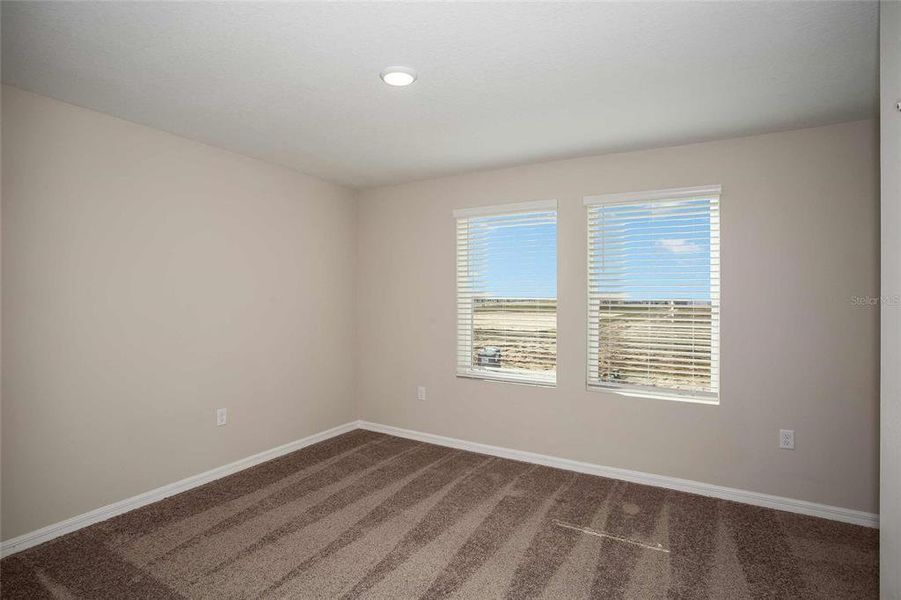 Spacious, unfurnished interior of a new home in Scenic Terrace, Haines City (Image 18).