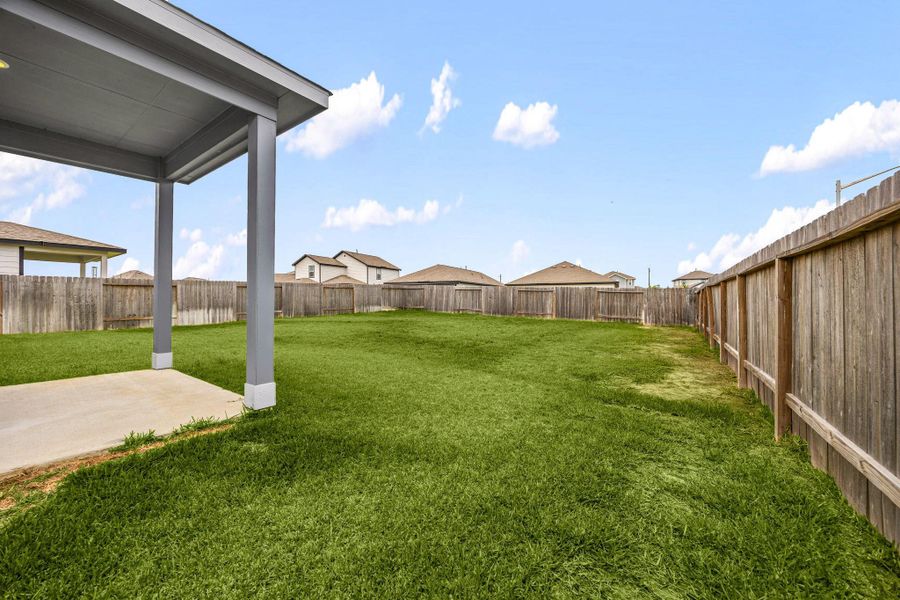 Exterior details and patio area of a home in Granger Pines, Conroe (Image 3).