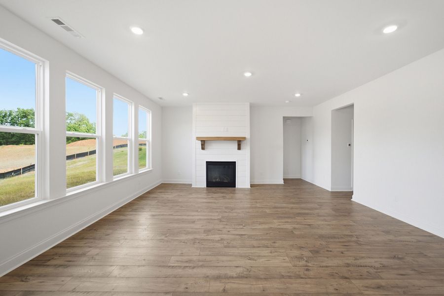 Spacious, unfurnished interior of a new home in Dorris Farm, White House (Image 28).