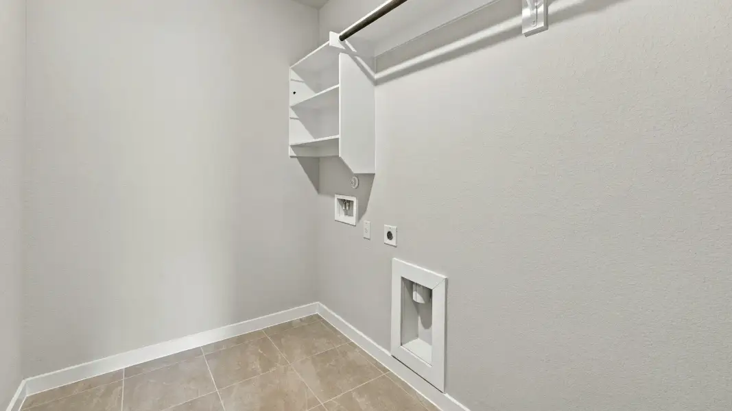 Furnished interior view inside a new home in Carillon, Manor (Image 14).