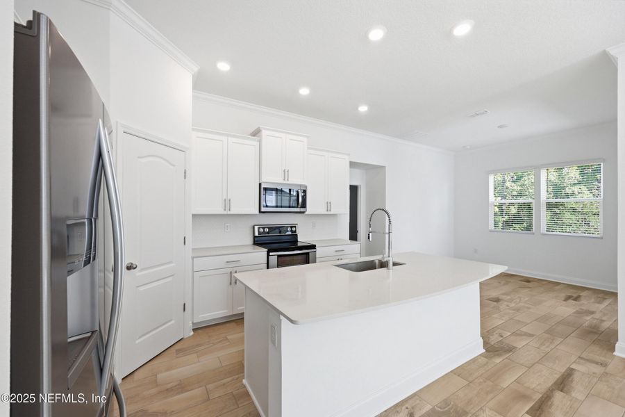 Furnished interior view inside a new home in , Palm Coast (Image 7). Furnished interior view inside a new home in , Palm Coast (Image 7).