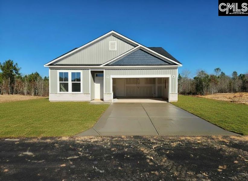 Front exterior of a new home in Old Charleston Acres, Pelion, SC, highlighting curb appeal (Image 1). Front exterior of a new home in Old Charleston Acres, Pelion, SC, highlighting curb appeal (Image 1).