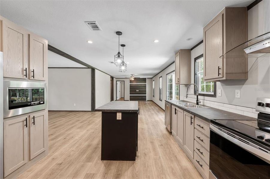 Furnished interior view inside a new home in , Dunnellon (Image 7).