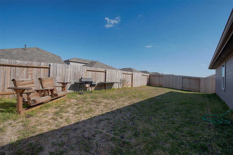 Backyard provides space for the kids to play and the family dog to run. Backyard provides space for the kids to play and the family dog to run.